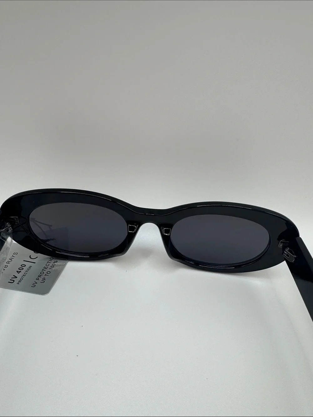 Black Oval Sunglasses - UV Protection